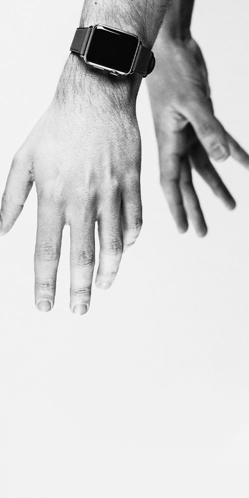 Two-hands-reaching-down-photography-style-by-Outsource-Marketing