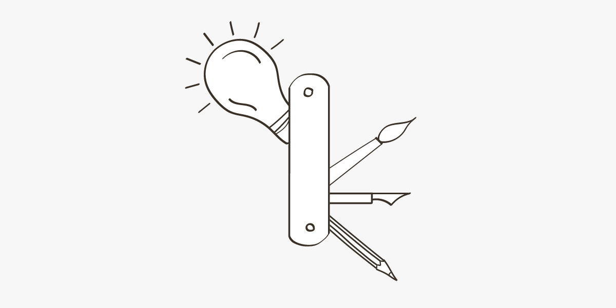 An image of a lightbulb and some other organizational tools on a blog about the benefits of marketing outsourcing
